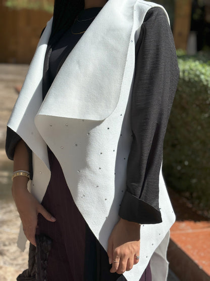 Asymmetrical vest